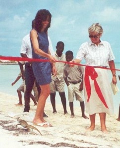 Ribbon Cutting on Long Cay - the Governor\'s snips the ribbon as iguanas are released on to Long Cay